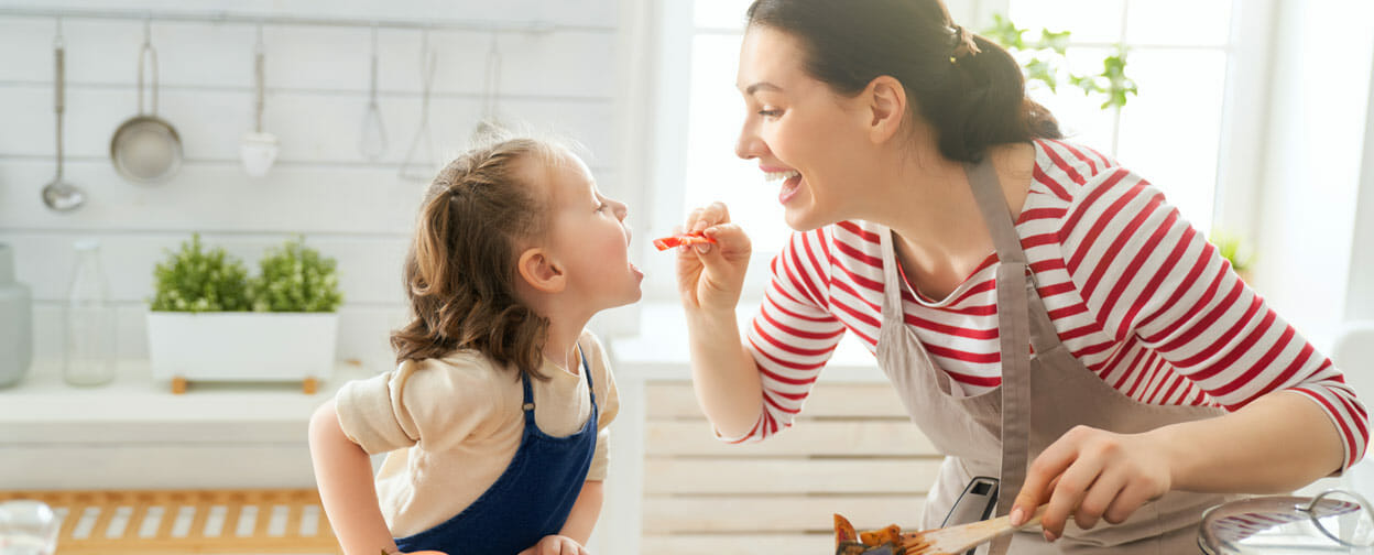 Photo of mother and child in the kitchen